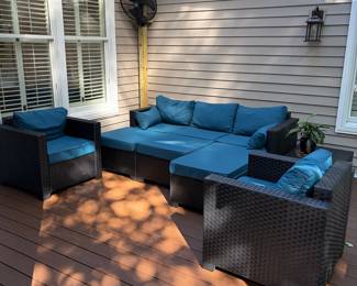 F62 - $175. 7 Piece Plastic Rattan Couch, Chairs, ottomans & side table. No issues noted. Stored on a covered back porch.  