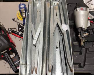 F52 - $20. Pair of Metal Folding Sawhorses. 