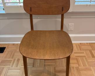 F61 - $300. Black Dining Room Table with 6 Wooden Chairs. All are newer and made to look like MCM furniture! Table measures 71" x 35.5" x 29.5" tall. Chairs are 19.5" wide x 21" deep x 33.25" tall. Seat to floor is 18".  Excellent condition and very gently used!