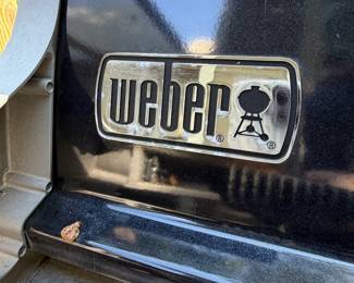 F63 - $100. Weber Spirit Grill. Propane tank is included (and 1/2 full!) Gently used - stored uncovered so there is very minor rust & fading.  