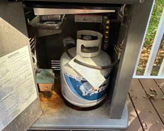 F63 - $100. Weber Spirit Grill. Propane tank is included (and 1/2 full!) Gently used - stored uncovered so there is very minor rust & fading.  