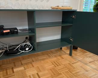 F76 - $100. Tenzo Uno Cabinet. Used in this home in the kitchen but versatile piece! Measures 58" x 15.5" x 35" tall. A few very minor scratches in the finish on the top but overall very good condition!