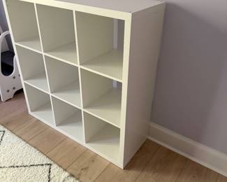 F31 - $40. 9 Cube Cubby Shelf in White. 