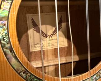 F100 - $150. Dean Acoustic Guitar Model CCE. Needs restrung. Includes case & stand. 