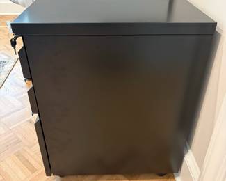 F70 - $40. Locking, Rolling, Metal Filing Cabinet. Measures 15.5" x 20" x 24.5" tall. One large file drawer, 2 smaller drawers. 