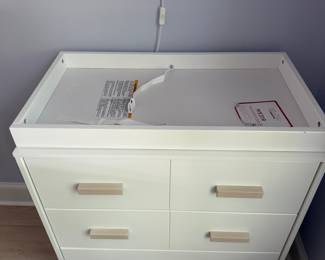 F25 - $75. Baby Letto Scoot Changing Table. In excellent condition! Measures 33" x 19.5" x 38" tall. 3 drawers all slide perfectly. 