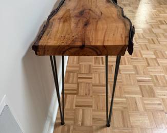 F12 - $150. Double Live Edge Sofa / Console Table. Measures 61" at the longest spot x 18" deepest x 32.5" tall. 