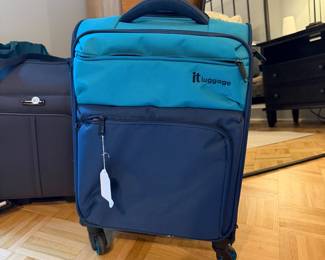 F93 - $50. it Luggage with 4 spinner wheels. Excellent condition. 
