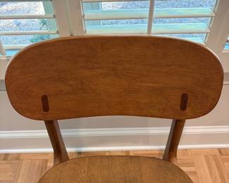 F61 - $300. Black Dining Room Table with 6 Wooden Chairs. All are newer and made to look like MCM furniture! Table measures 71" x 35.5" x 29.5" tall. Chairs are 19.5" wide x 21" deep x 33.25" tall. Seat to floor is 18".  Excellent condition and very gently used!