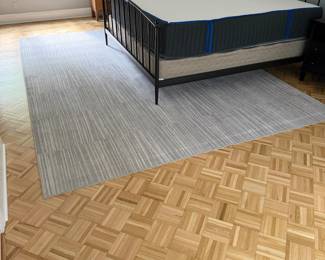 F39 - $350. 9' x 12' Ruggable with Pad underneath included. Very good condition!