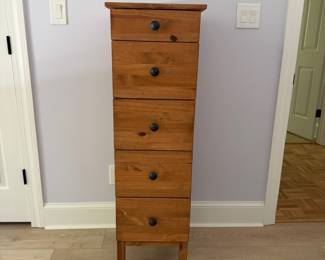 F24 - $50. Ikea Chest of Drawers. Measures 15.5" x 15.5" x 50" tall. All 5 drawers slide easily. Excellent condition. 