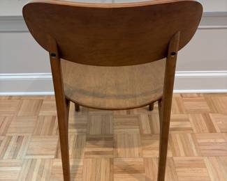 F61 - $300. Black Dining Room Table with 6 Wooden Chairs. All are newer and made to look like MCM furniture! Table measures 71" x 35.5" x 29.5" tall. Chairs are 19.5" wide x 21" deep x 33.25" tall. Seat to floor is 18".  Excellent condition and very gently used!