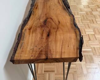 F12 - $150. Double Live Edge Sofa / Console Table. Measures 61" at the longest spot x 18" deepest x 32.5" tall. 