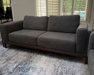 F7 - $250. Mingbo Smart Home Technology SOFA. Gently used and in excellent condition!  A tiny spot of pilling on one arm. Measures  84" long x 34" x 26" tall on arms 32" tall to the top of the cushions. 