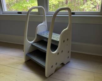 F33 - $15. Lightweight Plastic Kids Steps with handles. Tallest step is 14". Top of handles is 28". 