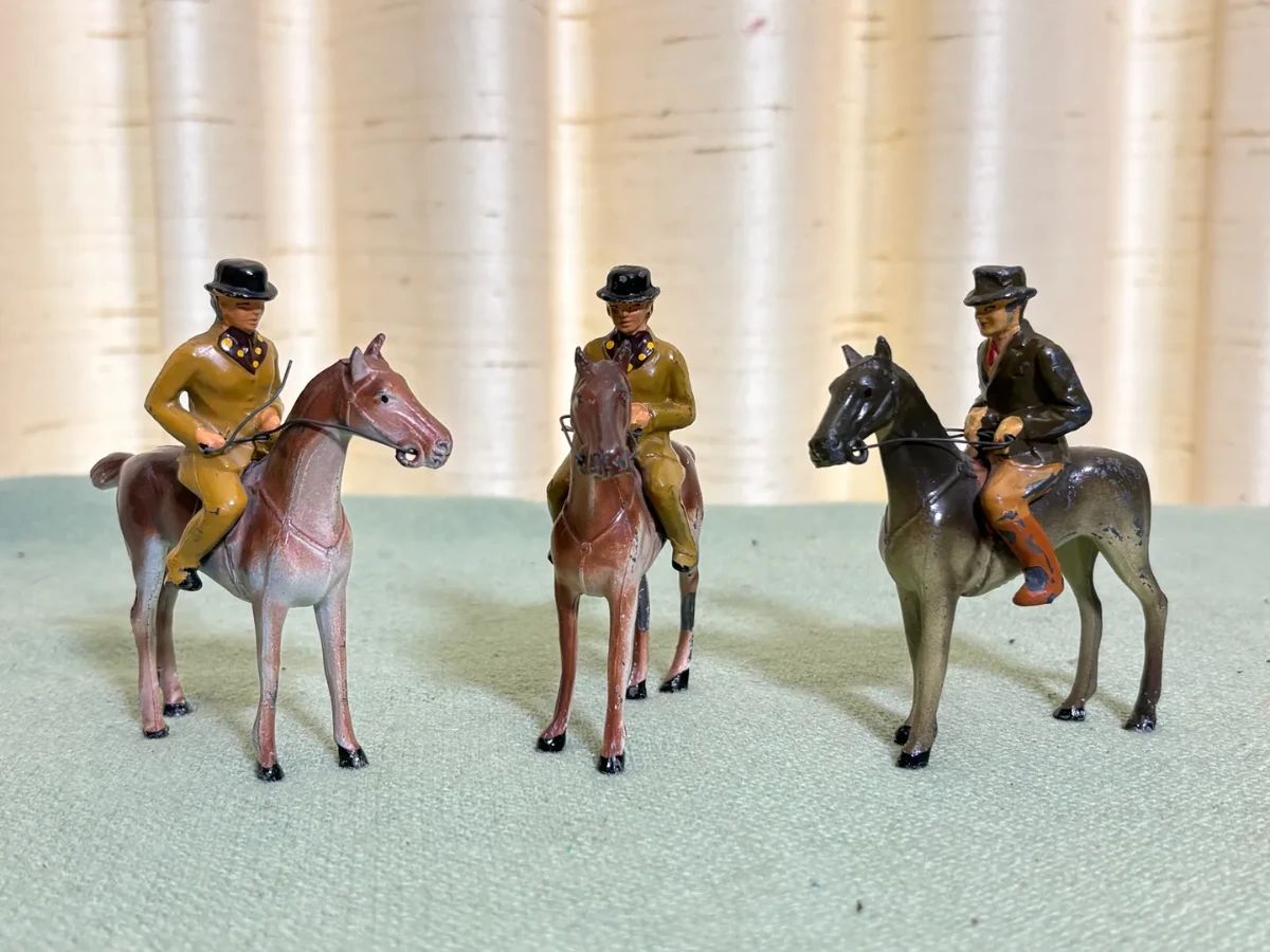 Three vintage cast iron heavy metal equestrian figurines