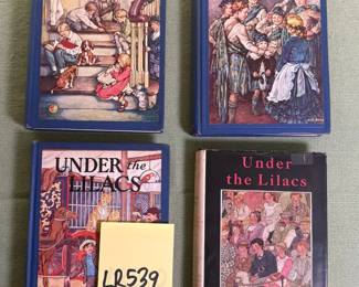 Four vintage hardcover books by Louisa May Alcott
