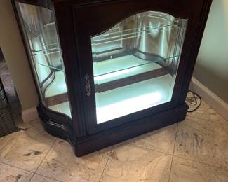 Mahogany lighted low curio cabinet 