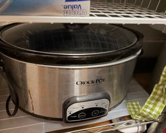 Large and smaller Crock pots