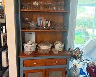 Farmhouse blue with wood trimmed display and storage cabinet