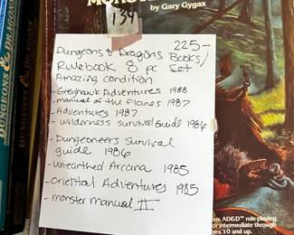 #134 Dungeons and Dragons Rule Book - 8 pc Amazing Condition $225.00