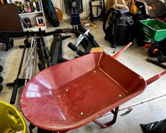 #084 Metal Wheelbarrow (as is flat tire) $25.00