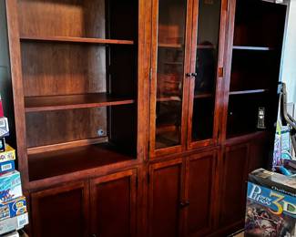 #158 BookCase w/8 doors & 2 shelves - 3 pieces each 28" wide - overall 84" x 18Dx76"T - Each piece comes apart into 2 pieces - Upstairs you move down - Has glass beveled Doors - You Move $75.00