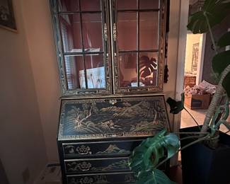 JASPER CABINET COMPANY Chinoiserie Secretary Jasper, Indiana A Dorset Corporation Company Model 827 | Brushed Black/Gold Hand-painted finish: HP #74 Circa 1972-1986 Hand-decorated black lacquer with gold Chinoiserie landscape motifs Glazed upper display cabinet with two adjustable glass shelves Drop-front secretary desk with leather writing surface Automatic pull-out desk supports Fitted red interior with pigeonholes and small drawers Four lower drawers with brass hardware Locking desk with original key Two built-in interior lights Approx. 78 1/2" H x 34 1/2" W x 16" D