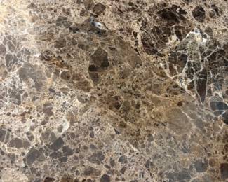 Embossed console with tessellated stone top (detail)...
