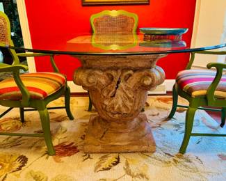 Monumental cast table base with glass top...