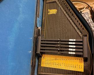vintage 12-chord, 36-string 1950s Oscar Schmidt Autoharp inside its original blue-lined case