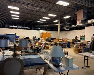 large warehouse packed with furnituore, tools, household items, home decor, outdoor equipment and much ore