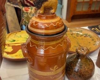 Redware jar with lion on lid, $185