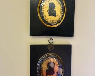 Pair 18th century reverse painted silhouettes, $525