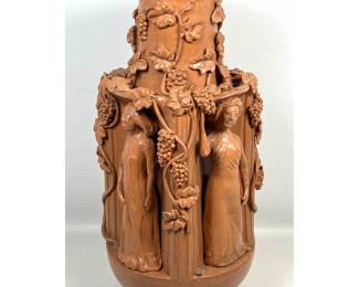 Lot 1877 Large Art Nouveau style glazed terracotta vase with high relief figural and botanical grapevine deco