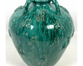 Lot 1487 13 Tall Green Drip Glazed Bulbous Vase. Four Handles sprout from top rim. Applied Relief Images of