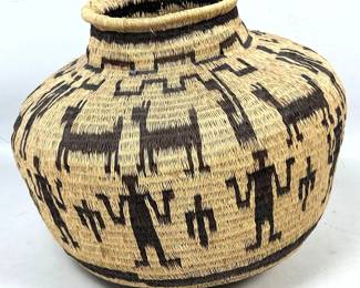 Lot 1975 Large Andean pictorial coiled basketry jar olla featuring human figures and llamas