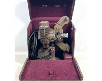 Lot 2049 Bell and Howell Filmo Diplomat Design 57 16mm Projector with Case and 2 Reels