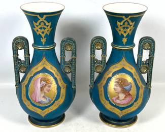 Lot 1888 Pair French porcelain portrait urn vases with hand painted classical panels and matte blue ground. P