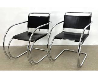 Lot 1517 Pr Mies van der Rohe Bauhaus Armchairs 2 Tubular Chrome and Black Leather Cantilever Armchairs. MR