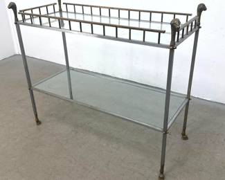 Lot 1446 2 Tier Neoclassical Style Steel and Brass Console Table with Rams Head Finials and Cloven Hoof Feet.