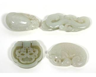 Lot 1867 Assortment of 4 Hand Carved Pale Celadon and Mutton Fat Nephrite Jade Toggles and Belt Fittings Feat