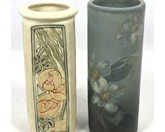 Lot 1895 2 Weller Art Pottery Vases featuring 1 relief molded floral 4 sided vessel and 1 hand painted dogwoo