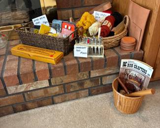Rug yarn in basket, Various leather craftsman tools