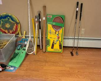 Badminton Set, Gold clubs, Bats, Lacrosse stick, diving flippers