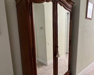 Armoire Restored Antique 8’ x 4’ x 20” deep. Shelving inside with Beveled Glass Mirrored Doors.