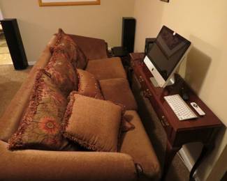 Sofa. Console Table. Computer speakers. Polk speaker towers.