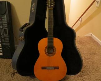 Vintage acoustic guitar and case-excellent condition