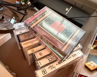 Collection of Assorted Estate Items including American Family Scale, Quartz Clock, Golf Ball Coin Bank, Soviet Pins, and Cassette Tapes fourth image