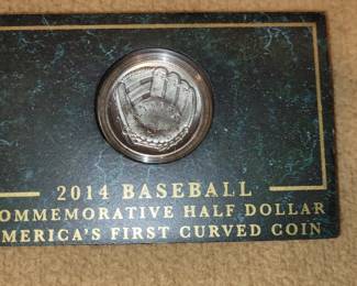 First curved coin